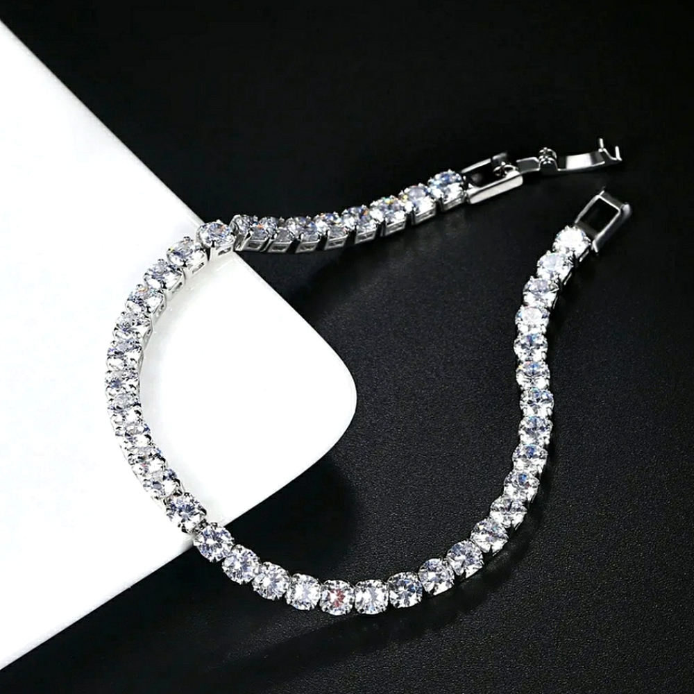 7" cubic zirconia silver tennis bracelet round studs; NWOT